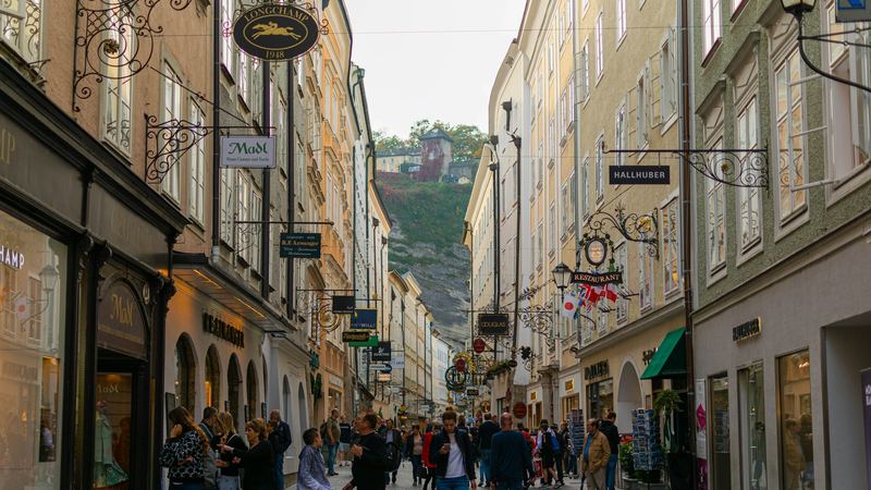 Salzburg Cathedral and the old town, seen through a window of the fortress