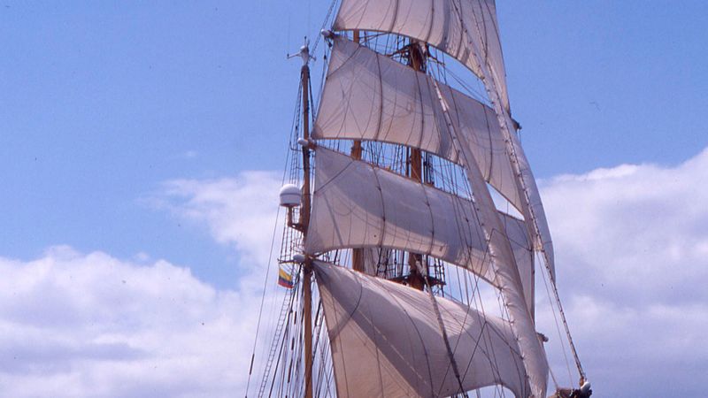 A three-masted barquentine under full sail