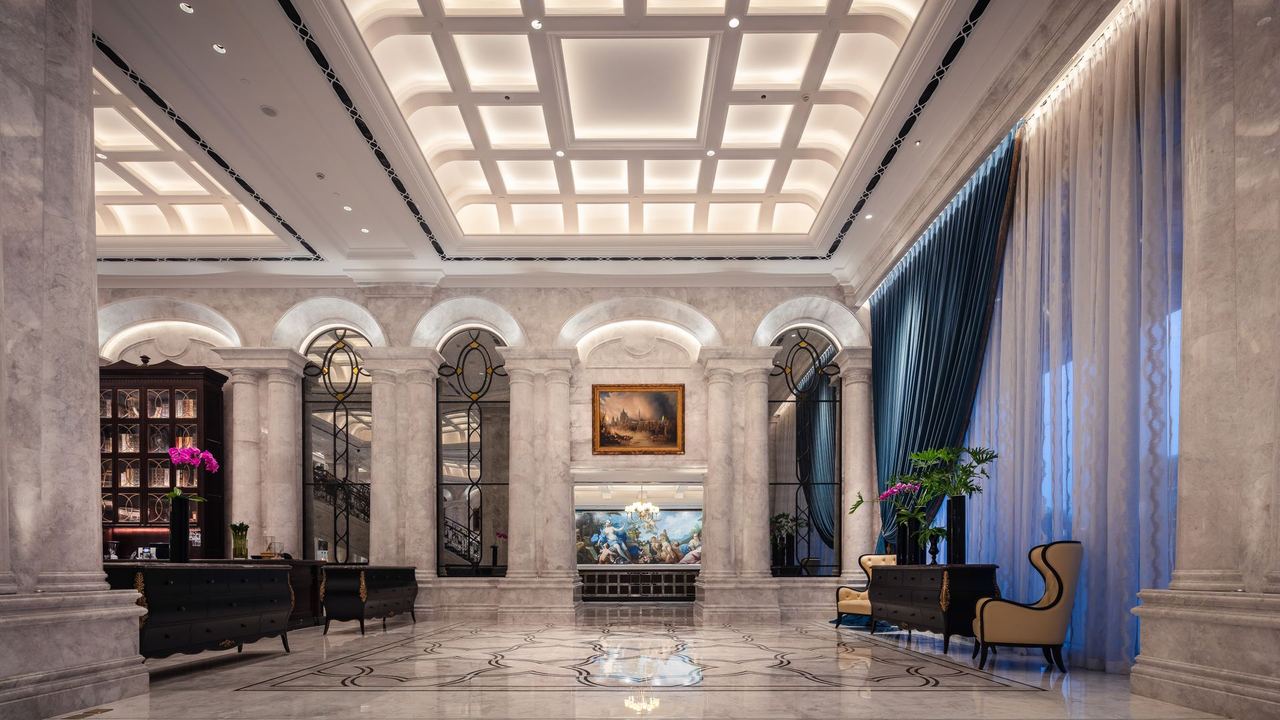 A five-star hotel lobby with flowers