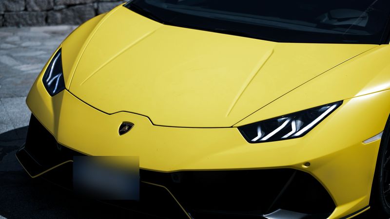 A yellow Lamborghini Huracán