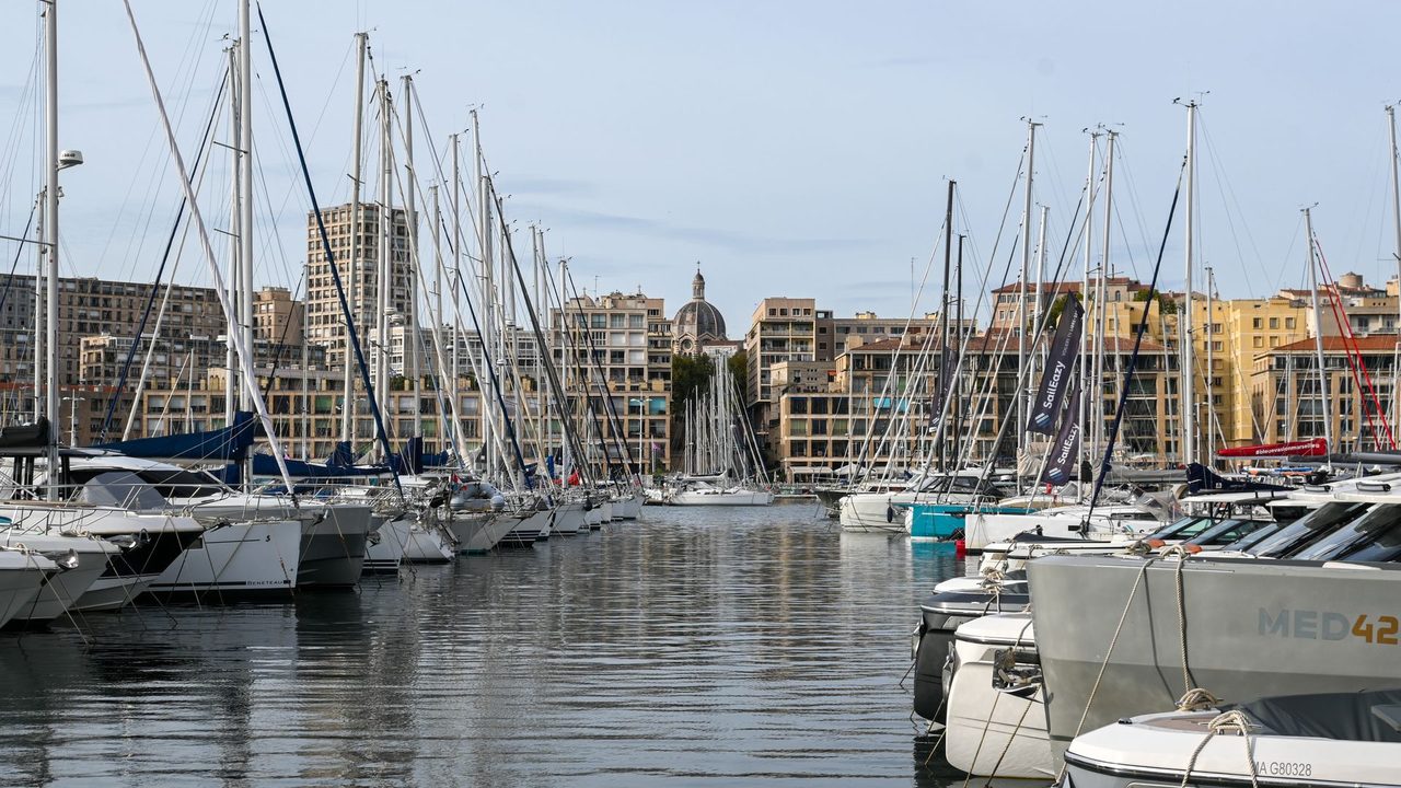 Yachts in the Old Port of Marseille, the dome of La Major cathedral beyond