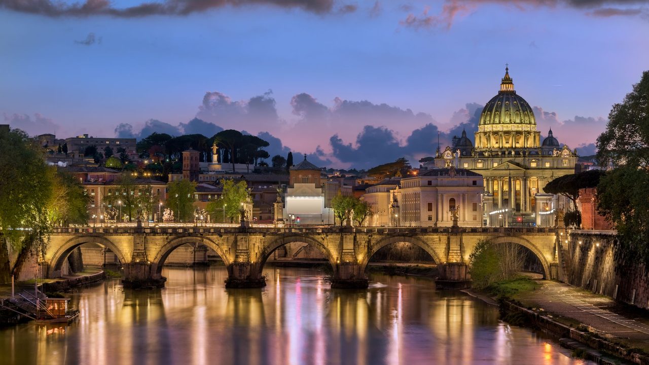 St Peter's and the Ponte Sant'Angelo over the Tiber at dusk, Rome