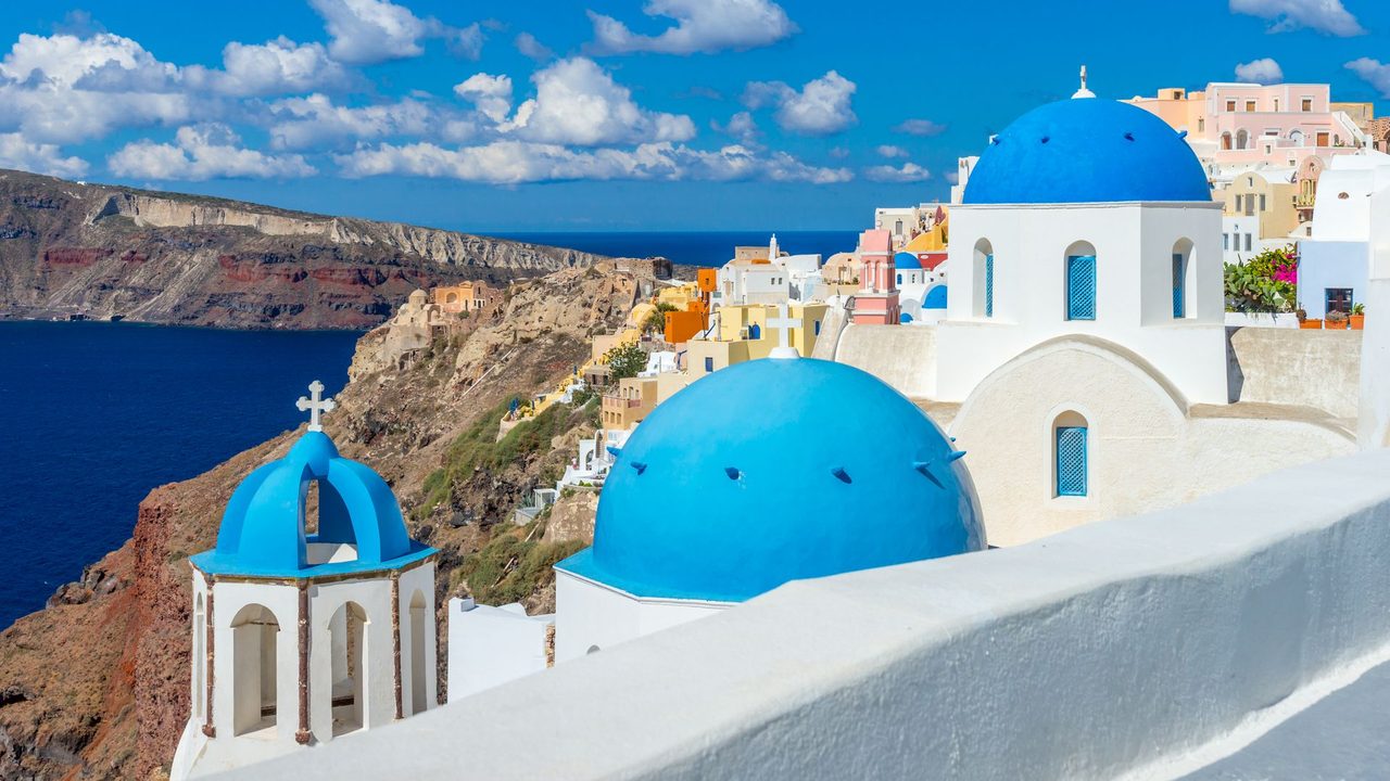The blue domes of Oia above the caldera of Santorini