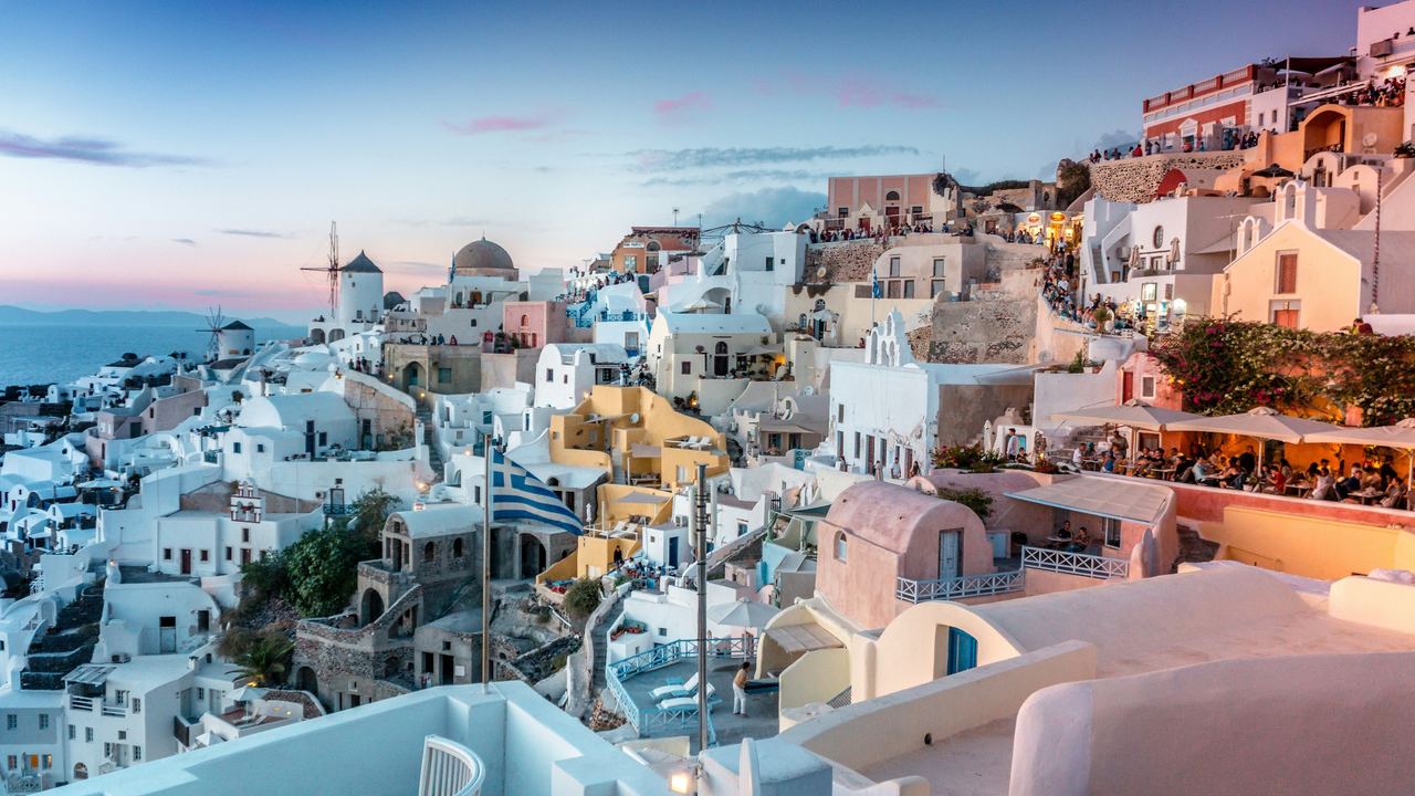 The white houses of Oia, Santorini, at dusk